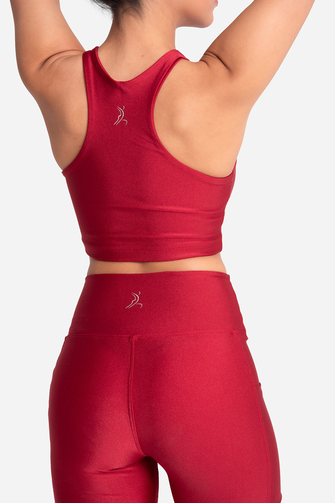 Red athletic outfit with a logo on a white background